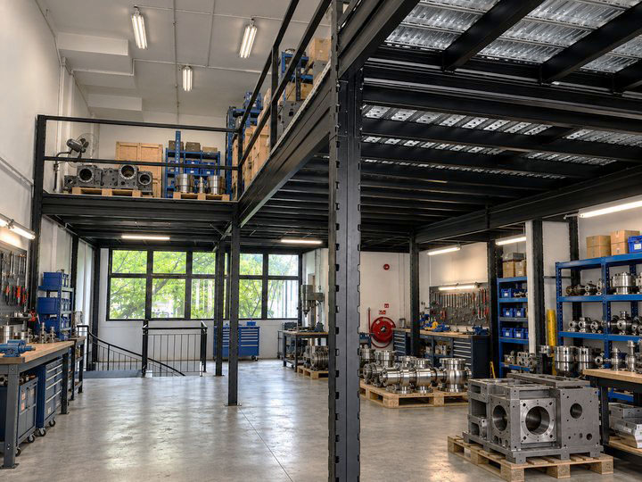 Concept illustration showing a steel mezzanine for machinery and equipment manufacturing in a manufacturing facility