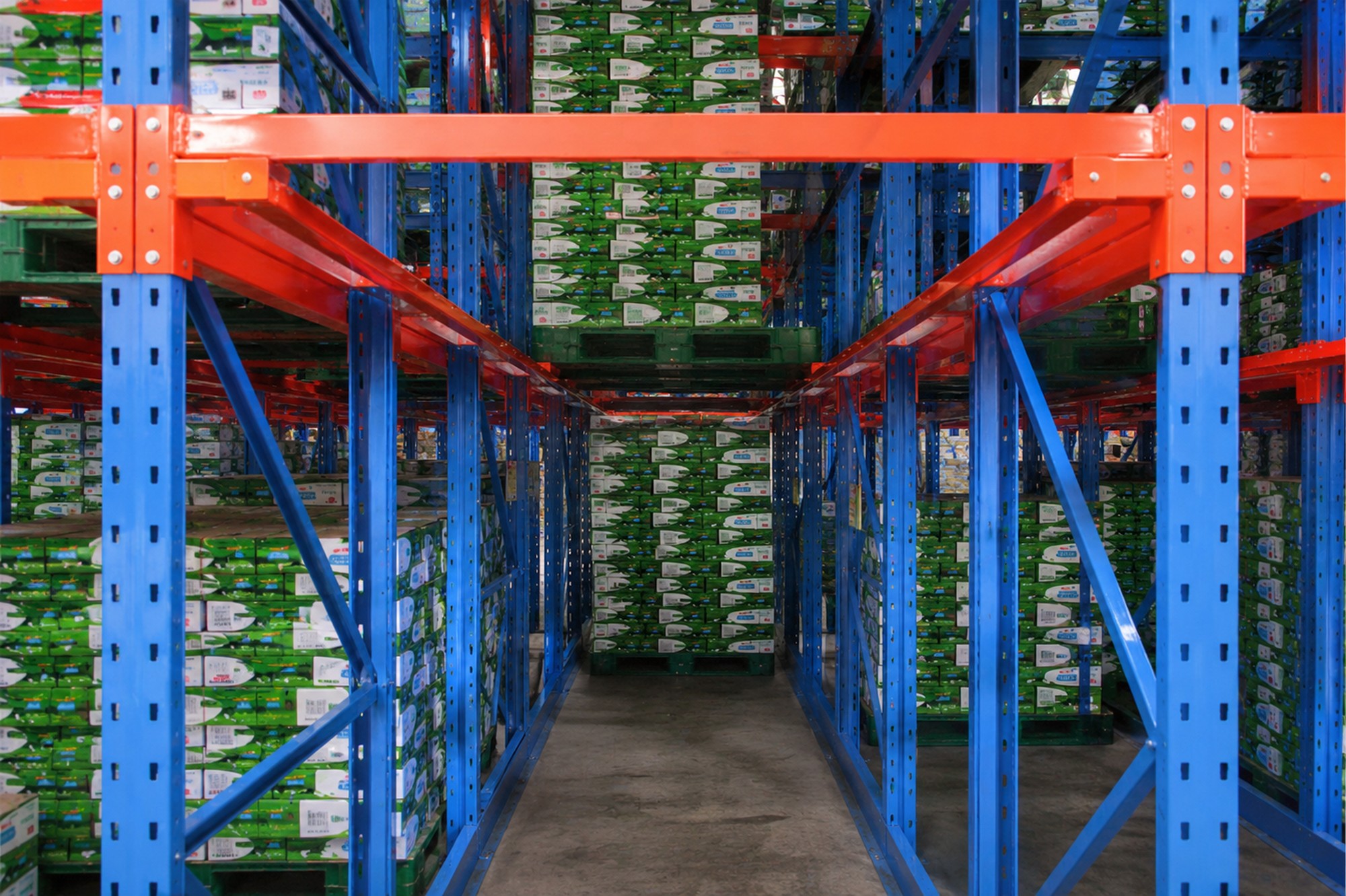Warehouse Commercial Industrial drive-in pallet racking centered lane depth green cartons racknsave Singapore