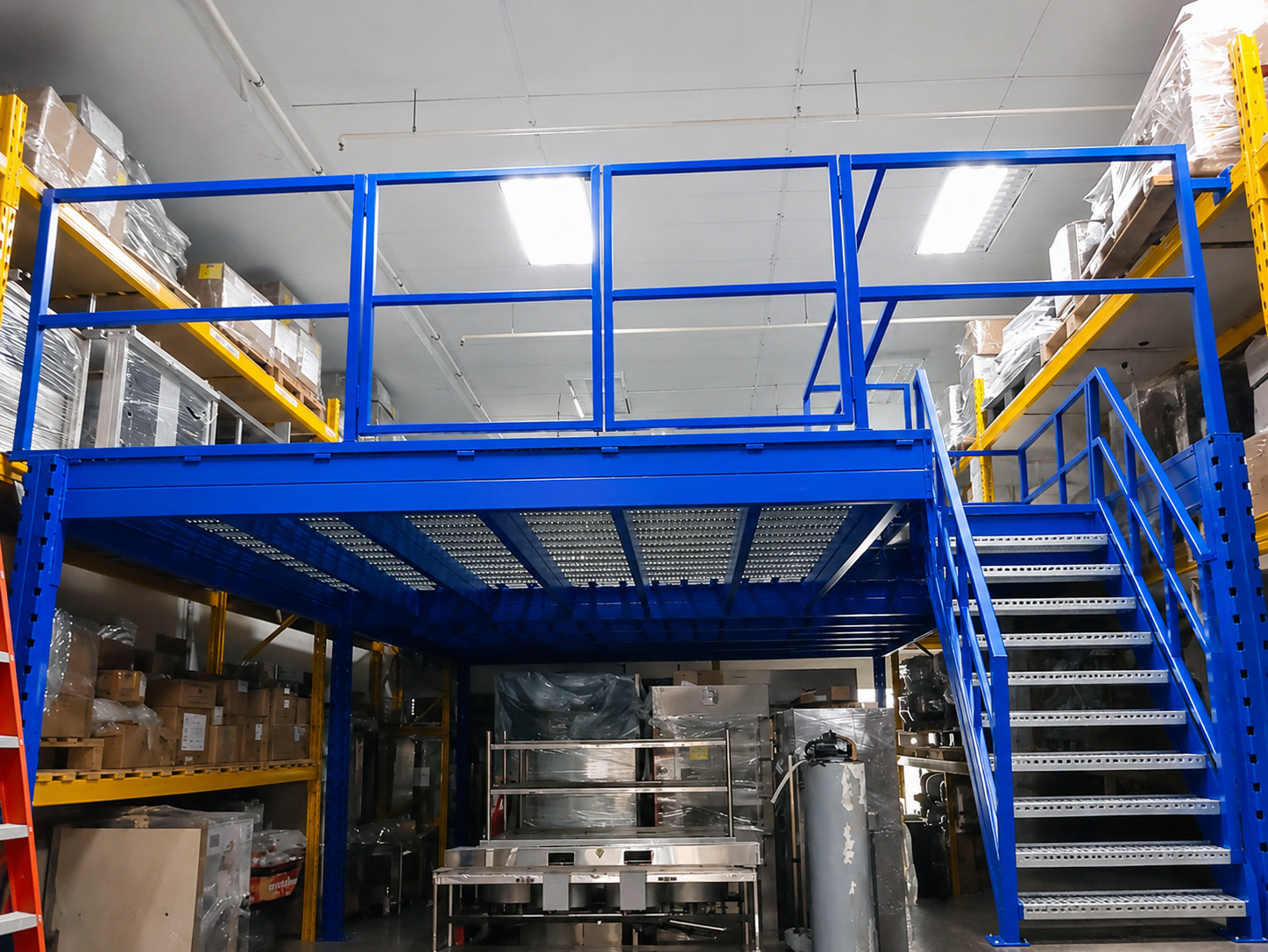Industrial mezzanine installation at Kaki Bukit Avenue 4 Singapore with blue steel platform and staircase