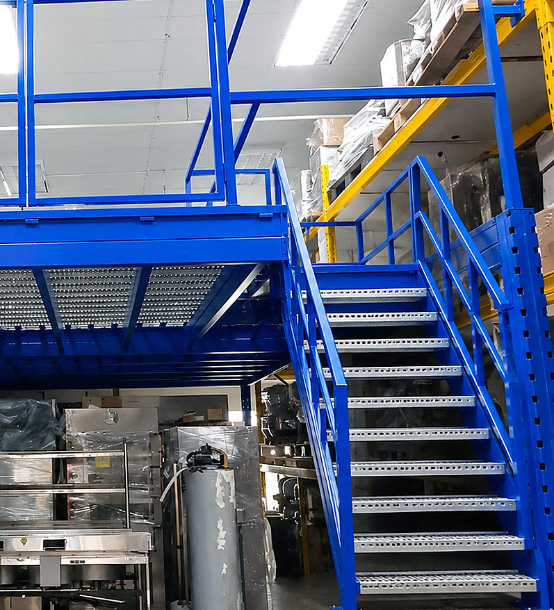Blue steel mezzanine staircase and safety guardrails Kaki Bukit Avenue 4 warehouse Singapore